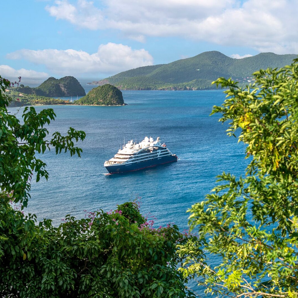 The PONANT EXPLORATIONS cruise ship Le Champlain sailing in the Bay of the Islands of Les Saintes, in Guadeloupe (French West Indies). 